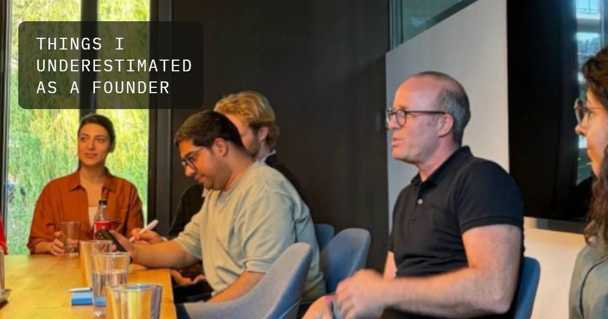 Gregor Zehetner in a meeting with founders around a table